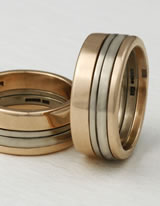 Two partnership rings in white and rose gold